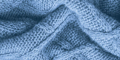 Jakarlı Örme (Jacquard Knit): Desenlerin Esnek Dünyası